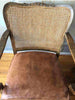 vintage caned chairs with leather seat