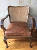 vintage cane and leather chairs