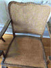 vintage walnut arm chairs with cane seat and back