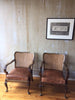 pair vintage chairs leather cushions